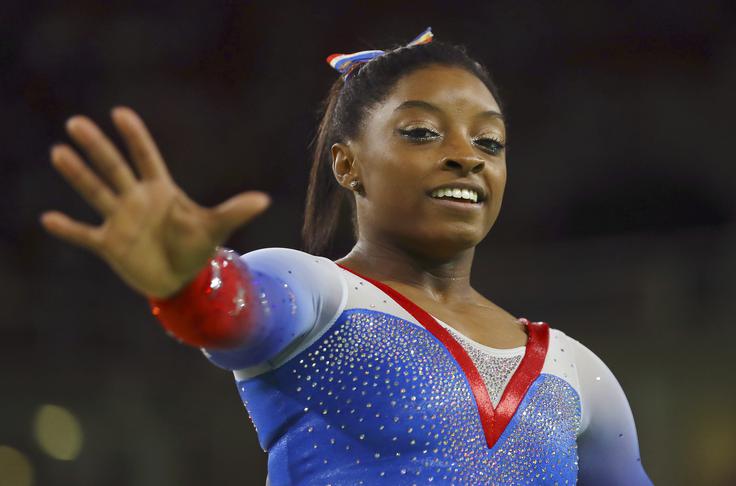 V ženski konkurenci so največ glasov namenili ameriški telovadki Simone Biles. | Foto: Reuters