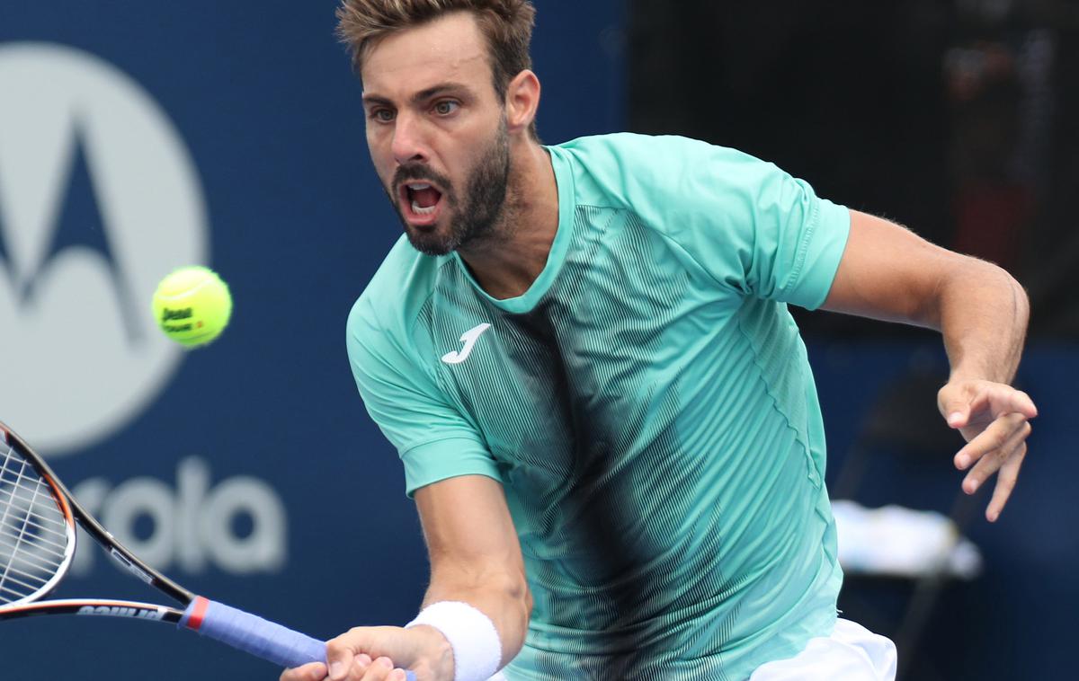Marcel Granollers | Marcel Granollers je imel nevšečnosti na treningu, in sicer med tekom na plaži. | Foto Reuters