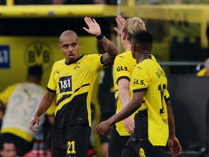 Donyell Malen je zadel za zmago Dortmunda. | Foto: Reuters
