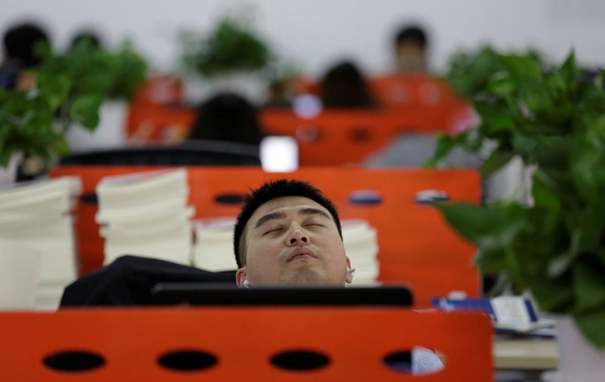 Kitajska, pisarna, spanje | Foto Reuters