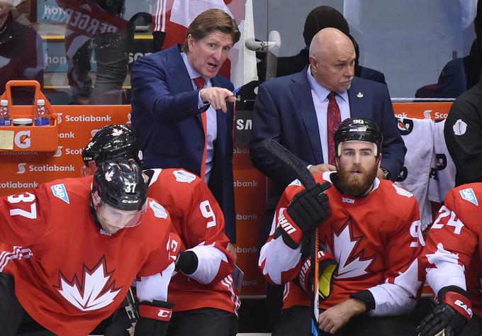 "To je najboljši dogodek, ki se ga lahko udeležiš. Razočaran sem," pravi kanadski strateg Mike Babcock (levo).  | Foto: Reuters