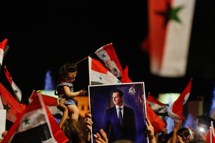 Bašar al Asad | Privrženi Bašarja Al Asada med praznovanjem njegove zmage na volitvah. | Foto Reuters