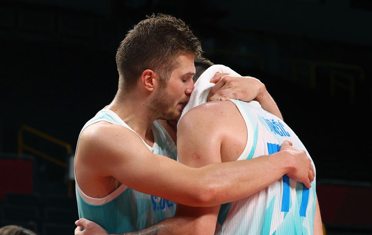 Slovenija : Avstralija, tekma za 3. mesto OI | Dino Murić je čustveno doživljal srečne in žalostne trenutke svojega brata Eda, ki je imel vlogo kapetana slovenske reprezentance. | Foto Reuters