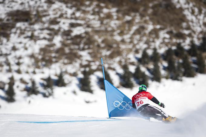 Rok Marguč, svetovni prvak iz leta 2013, Peking zapušča s 25. mestom in nepozabno izkušnjo zastavonoše na odprtju olimpijskih iger. | Foto: Anže Malovrh/STA