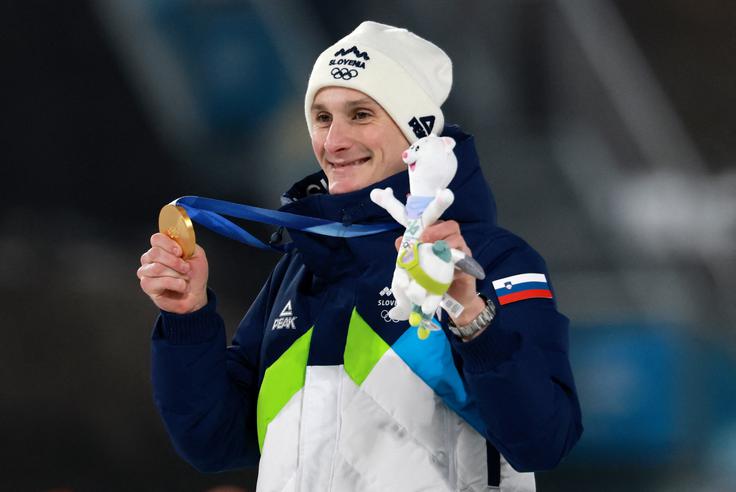 Domen Prevc z zlatim odličjem | Foto: Reuters
