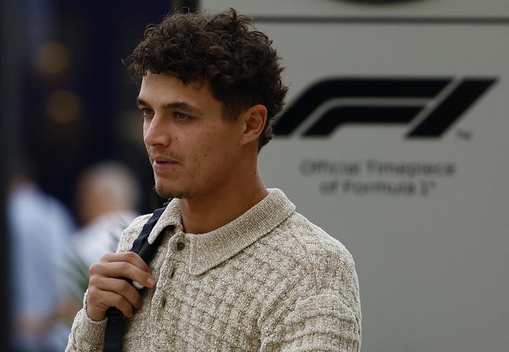 Lando Norris se Verstappnovim besedam samo smeje. | Foto: Reuters
