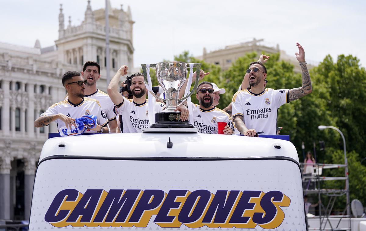 Real Madrid parada | Nogometaši Reala do v nedeljo na trgu Cibeles proslavili nov naslov državnega prvaka. | Foto Reuters