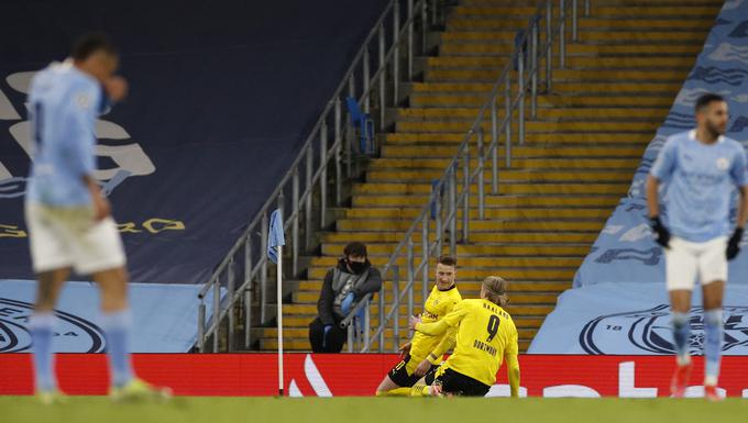 Marco Reus je v 84. minuti izenačil na 1:1. To je bil njegov 18. zadetek v ligi prvakov za rumeno-črne, s čimer je na klubski lestvici prehitel Roberta Lewandowskega (17). | Foto: Reuters