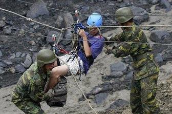 Na Tajvanu po tajfunu še vedno ujetih okoli 15.000 ljudi