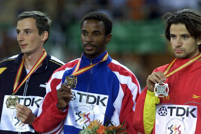 Gregor Cankar SP Sevilla 1999 | Na današnji dan pred 20 leti je Gregor Cankar na svetovnem prvenstvu v Sevilli osvojil bronasto odličje v skoku v daljino. | Foto Reuters