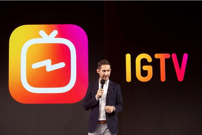 Aplikacijo IGTV, na fotografiji je njena ikona oziroma logotip, je že mogoče prenesti na pametne telefone z operacijskim sistemom Android in pametne telefone iPhone. Na fotografiji direktor Instagrama Kevin Systrom. | Foto: Instagram & Imdb