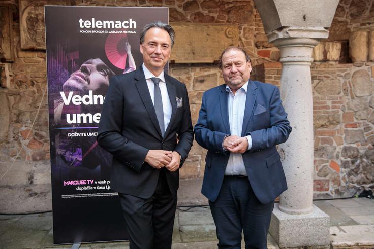 Tomislav Čizmić, predsednik poslovodstva Telemach Slovenija in Darko Brlek, direktor Festivala Ljubljana. | Foto: Sandi Fišer / Telemach