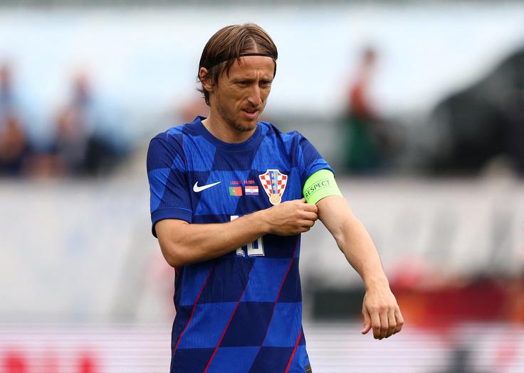 Luka Modrić je na Portugalskem popeljal Hrvaško v vodstvo v osmi minuti. To je bil njegov 24. zadetek za ognjene v rekordnem 174. nastopu.
 | Foto: Reuters