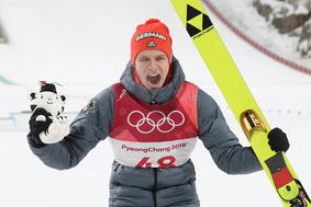 Branilec olimpijskega naslova znižal pričakovanja za Peking