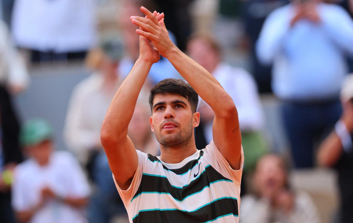 Carlos Alcaraz | Carlos Alcaraz je po štirih setih strl Bena Sheltona in napredoval v četrtfinale. | Foto Reuters