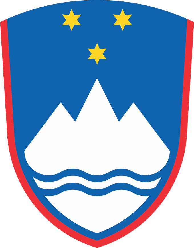 Grb Republike Slovenije, ki ga stroka uvršča med embleme zaradi upodobitve zobčastega lika in ne heraldične gore ter rdeče obrobe.
Avtor Marko Pogačnik, 1991. | Foto: 