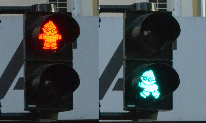 V Mainzu stoji 11 semaforjev za pešce, ki jih krasijo Mainzelmännchen, priljubljeni risani junaki s televizije ZDF (ta ima sedež v Mainzu). | Foto: Thomas Hilmes/Wikimedia Commons