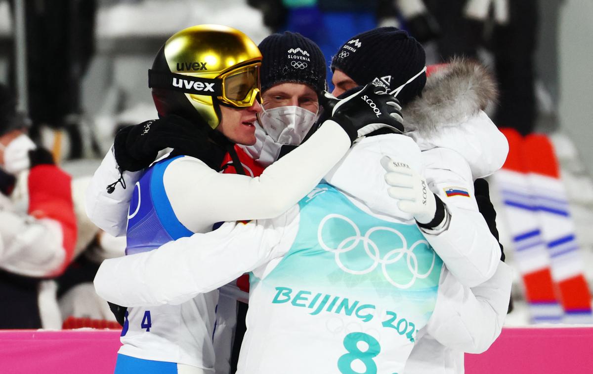 slovenski skakalci ekipna Peking | Slovenska ekipa je skočila do olimpijskega srebra. | Foto Guliverimage