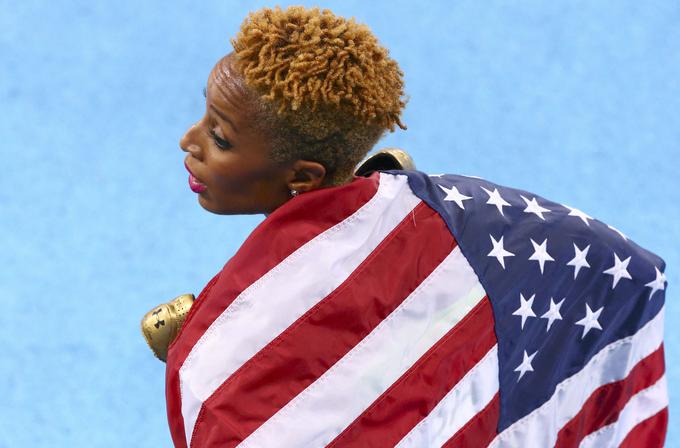 Američanka Natasha Hastings, ki je z ameriško štefeto na 400 metrov osvojila olimpijsko zlato, se je odločila za precej krajšo različico. | Foto: Reuters