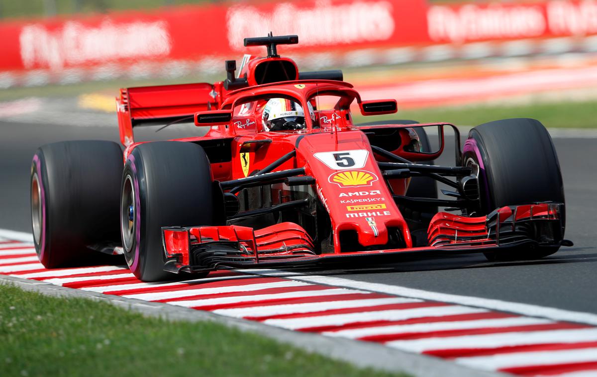 Sebastian Vettel | Nemec Sebastian Vettel bo tudi v prihodnji sezoni vozil za Ferrari. | Foto Reuters