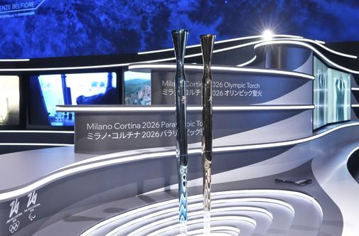 V Milanu in Osaki razkrili olimpijsko plamenico