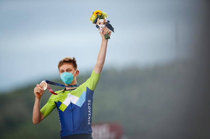Slovensko nabiranje olimpijskih medalj v Tokiu je začel Tadej Pogačar z bronom na cestni dirki. | Foto: Anže Malovrh/STA