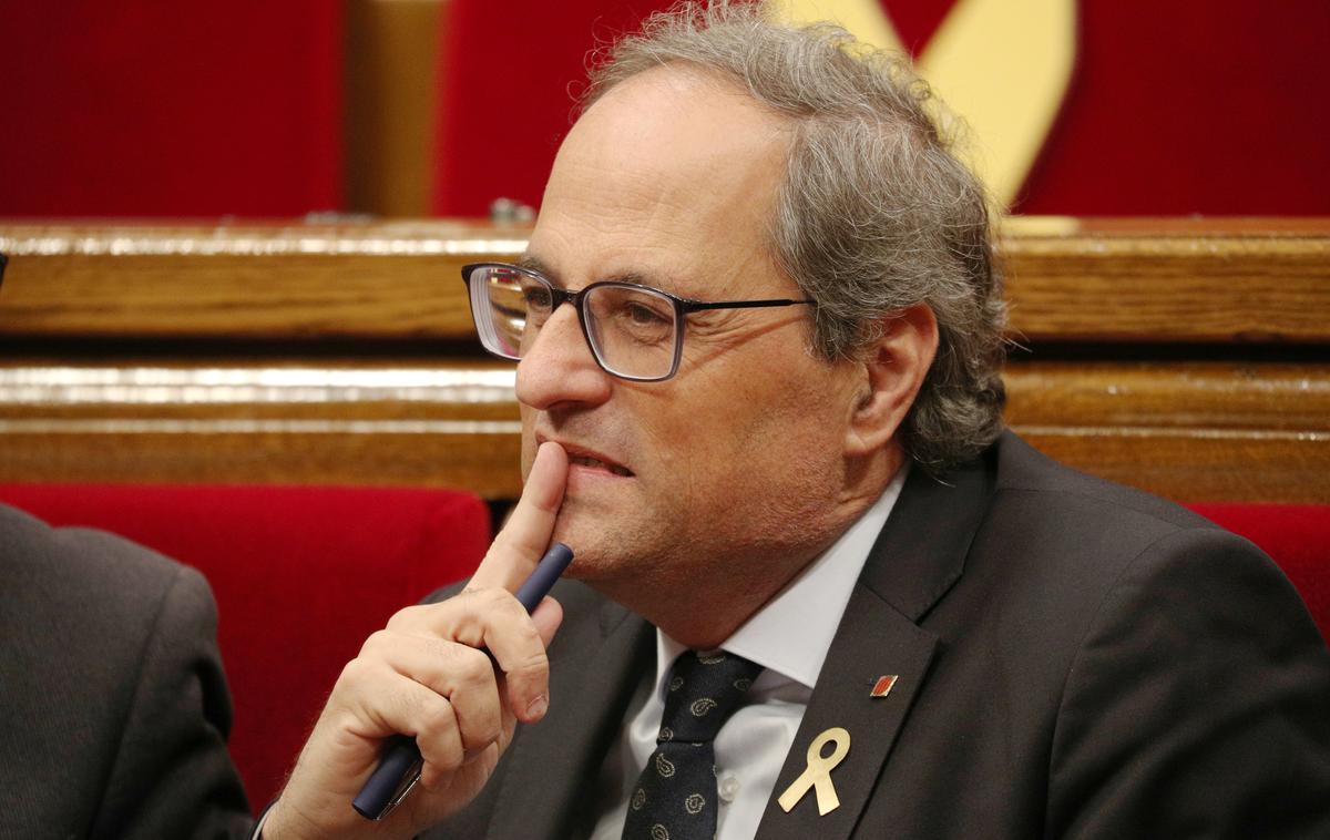 Quim Torra | "Slovenci so se odločili, da gredo naprej z vsemi posledicami. Bodimo kot oni in bodimo pripravljeni na vse, da bi živeli svobodno," je po poročanju francoske tiskovne agencije dejal Torra. | Foto Reuters