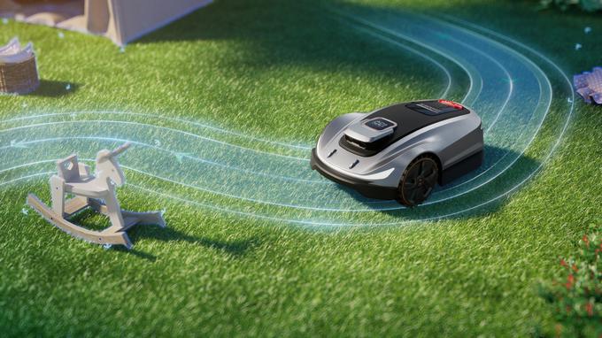 Brezžična robotska kosilnica Sunseeker Elite se prilagaja terenu in okolju ter se obenem aktivno izogiba oviram na vašem vrtu. | Foto: Eurogarden, Rotar in Ramda