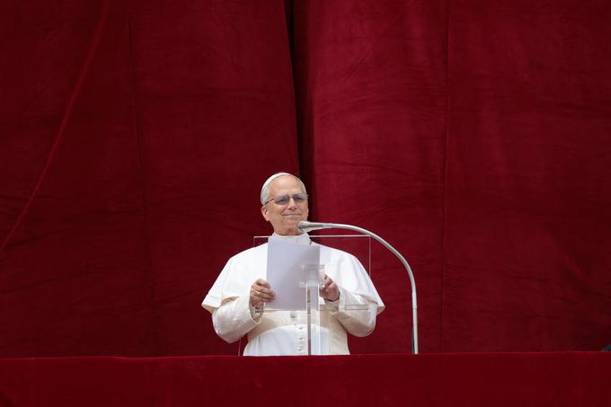 Papež Leon XIV. je imel prvi nagovor z osrednjega balkona bazilike svetega Petra. | Foto: Reuters