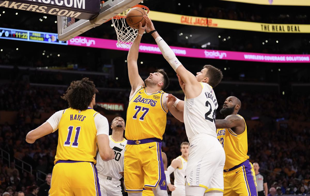 Walker Kessler Luka Dončić | Walker Kessler v obrambni akciji proti Luki Dončiću | Foto Guliverimage