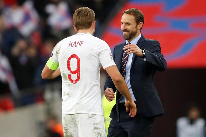 Gareth Southgate, Harry Kane | Gareth Southgate in napadalec Harry Kane sta med prejemniki letošnjih odlikovanj britanske kraljice Elizabete II. | Foto Reuters