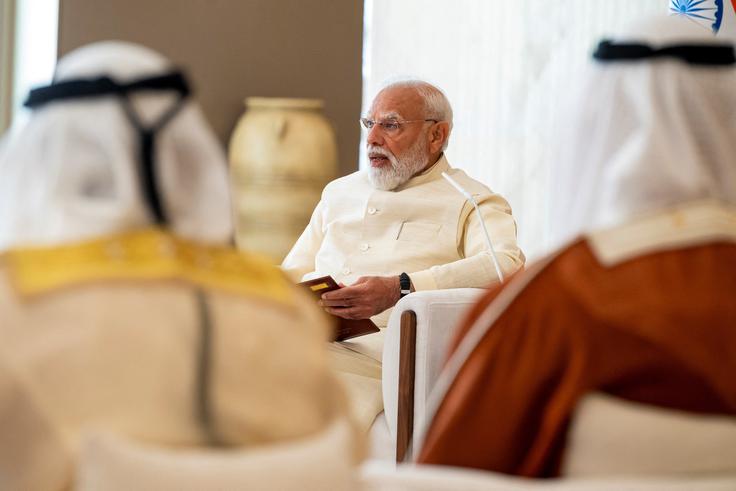 "Prišel sem v svoj drugi dom," je ob obisku ZAE dejal Modi. | Foto: Reuters