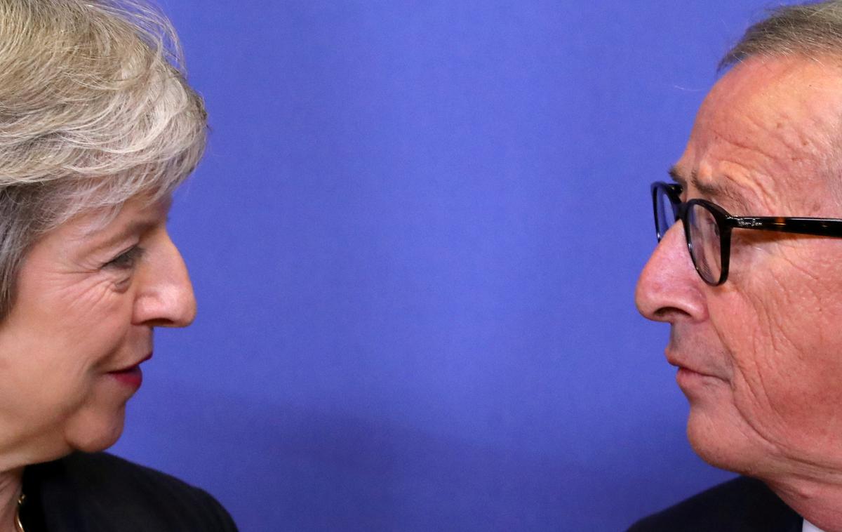 Theresa May, Jean-Claude Juncker | Predsednik Evropske komisije Jean-Claude Juncker je dal britanski predsednici vlade Theresi May jasno vedeti, da je "to edini mogoči dogovor". | Foto Reuters