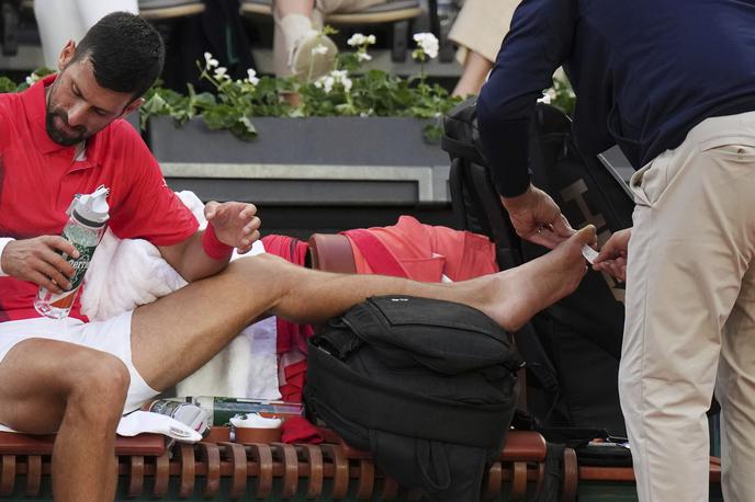 Novak Đoković | Novak Đoković je imel med dvobojem nekaj težav z žulji, opisal pa je tudi kolesarjenje po Parizu. | Foto Guliverimage