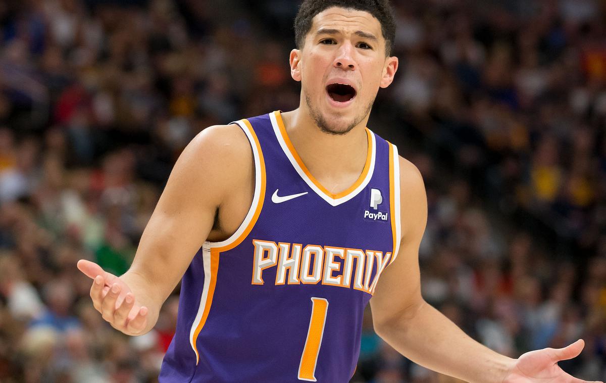 Devin Booker | Devin Booker je na tekmi proti Washingtonu dosegel 50 točk in postal šele tretji igralec v ligi NBA, ki je 50 točk dosegel na treh tekmah že pred svojim 23. rojstnim dnem. | Foto Reuters