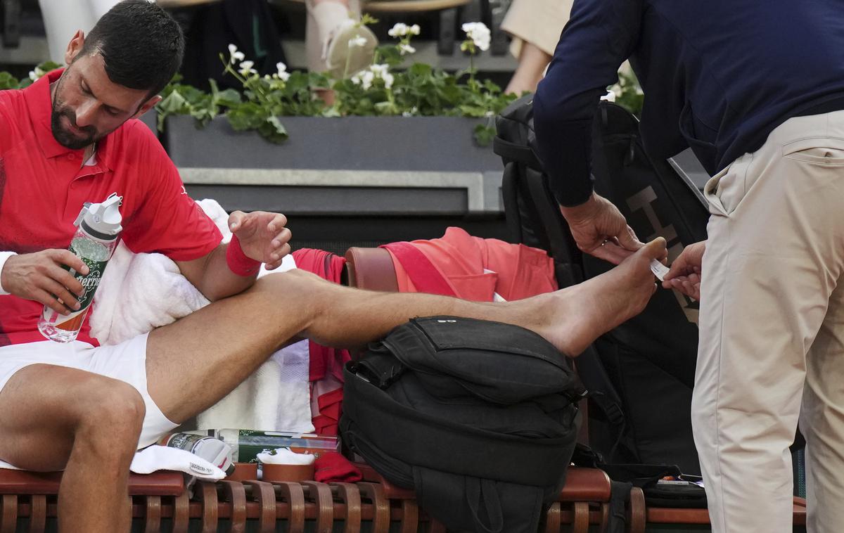 Novak Đoković | Novak Đoković je imel med dvobojem nekaj težav z žulji, opisal pa je tudi kolesarjenje po Parizu. | Foto Guliverimage