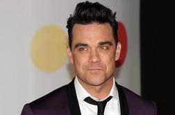 Robbie Williams: Hčerki bom kupil drogo, če bo hotela