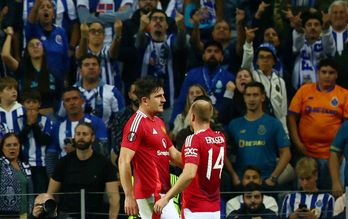 Harry Maguire | Harry Maguire je v sodnikovem podaljšku popeljal Manchester United do točke na Portugalskem (3:3). | Foto Reuters