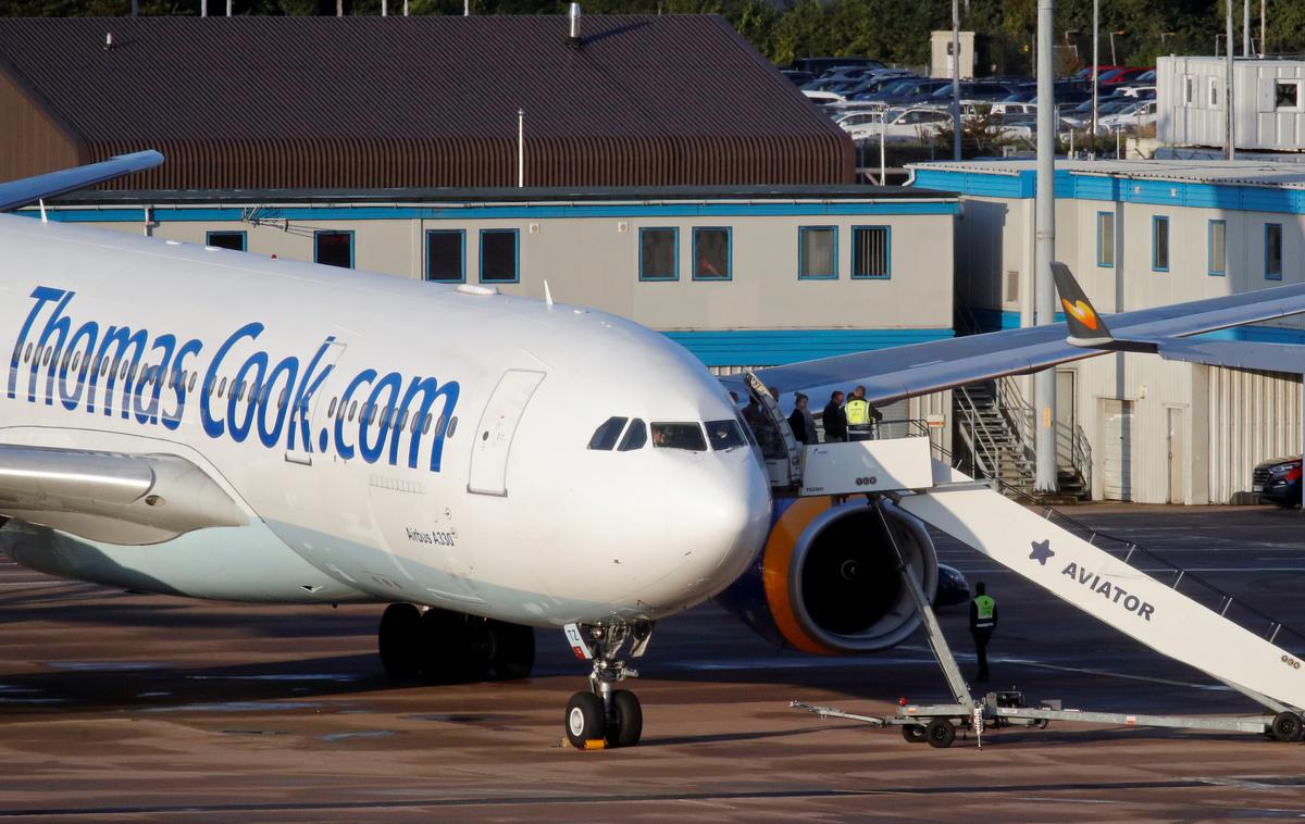 Thomas Cook letalski prevoznik | Le nekaj dni, preden je bila Adria Airways prisiljena zahtevati stečaj, je podobna usoda doletela eno od najstarejših potovalnih agencij in istoimenskega prevoznika – britansko družbo Thomas Cook. | Foto Reuters