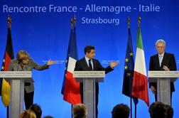 Merklova in Sarkozy: Padec Italije bi pomenil dokončen konec evra