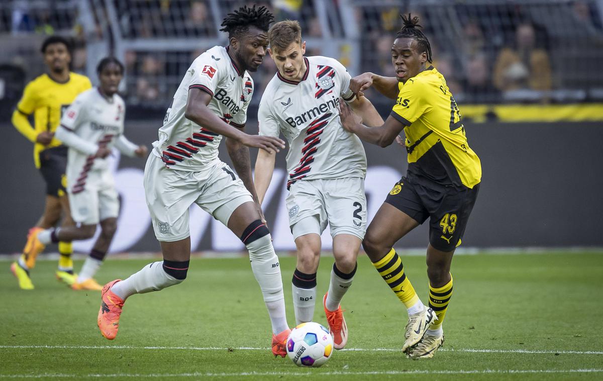 Borussia Dortmund - Bayer 04 Leverkusen | Bayer, ki si je že zagotovil naslov nemškega prvaka, je na gostovanju v Dortmundu v 97. minuti vknjižil točko in niz neporaženosti podaljšal na 45 tekem. | Foto Guliverimage
