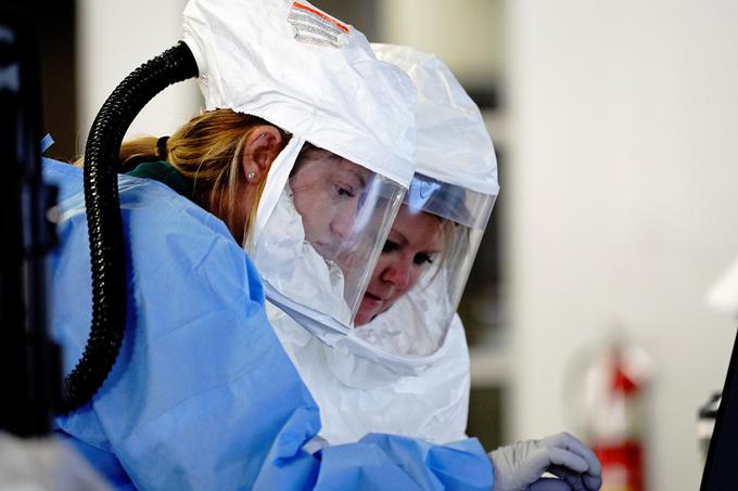 V ZDA so v petek že tretji dan zapored potrdili rekordno dnevno število novih okužb z novim koronavirusom.  | Foto: Reuters