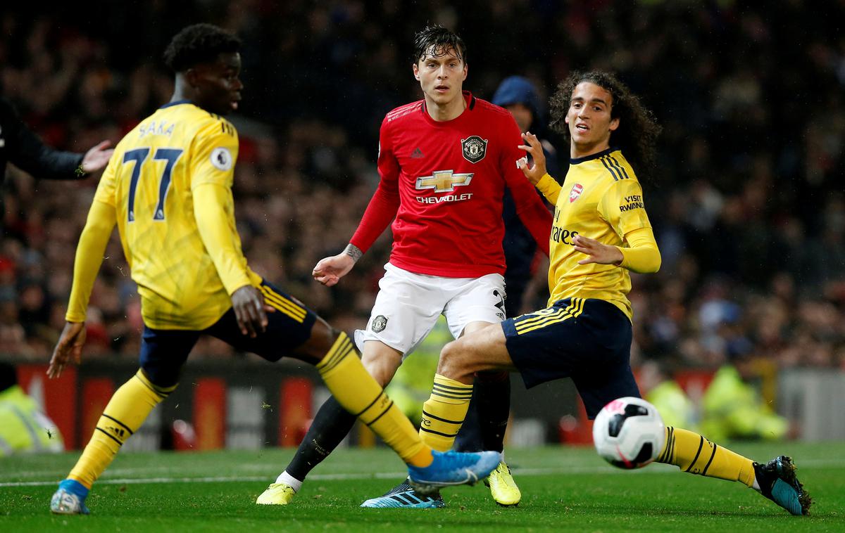 Manchester United Arsenal | Manchester United in Arsenal sta v zadnji tekmi 7. kroga angleškega prvenstva remizirala. | Foto Reuters
