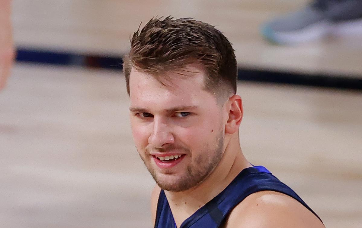 Luka Dončić | Luka Dončić bo decembra vstopil v tretjo sezono lige NBA, precej večje pa je vprašanje, ali bo poleti znova oblekel slovenski dres. | Foto Getty Images
