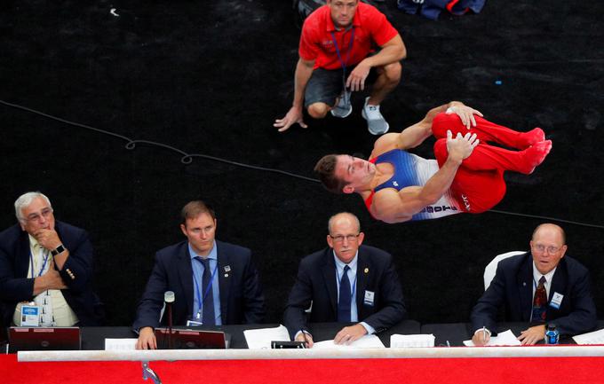 17. avgust: ameriški telovadec Sam Mikaluk med nastopom na ameriškem državnem prvenstvu. | Foto: Reuters