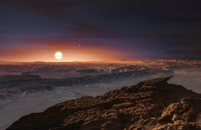 Proxima b je od svoje zvezde oddaljen samo 7,5 milijona kilometrov, kar pomeni, da ji je desetkrat bliže kot Merkur našemu Soncu. A Proxima Centauri je majhna in razmeroma hladna zvezda (spada v družino rdečih pritlikavk), zato na površini Proxime b ni prevroče. Takšen prizor pa bi videli, če bi stali na planetu, menijo astronomi. | Foto: Reuters