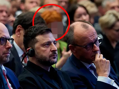 Kdo je skrivnostna ženska za Zelenskim, ki ji v Nemčiji skrivajo obraz?