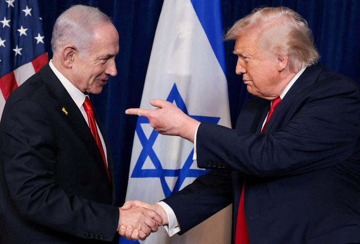  "Če mu rečem, naj nekaj naredi, to tudi stori," je o odnosu z Netanjahujem povedal Trump. | Foto: Reuters