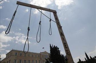 Grški parlament kljub protestom potrdil varčevalni načrt