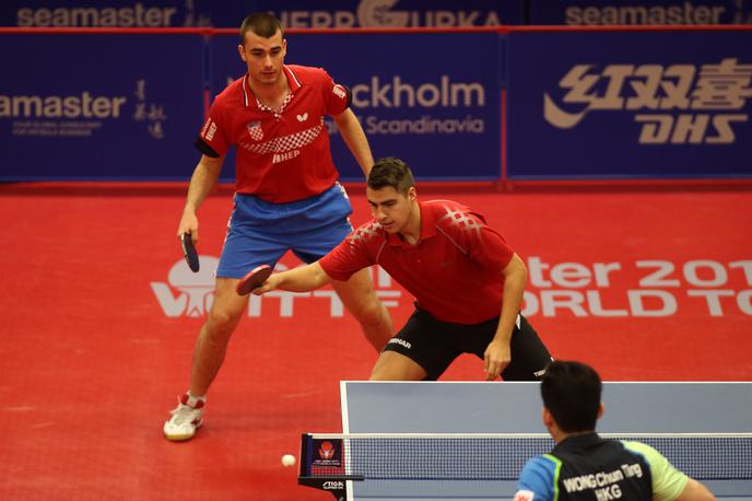 Darko Jorgić Tomislav Pucar | Najboljši slovenski namiznoteniški igralec Darko Jorgić in Hrvat Tomislav Pucar sta končala nastope na svetovnem prvenstvu v Dohi v konkurenci dvojic. | Foto worldtabletennis.com